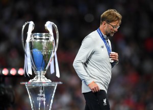 KIEV, UKRAINE - MAY 26: Jurgen Klopp, Manager of Liverpool walks past the UEFA Champions League trophy following the UEFA Champions League Final between Real Madrid and Liverpool at NSC Olimpiyskiy Stadium on May 26, 2018 in Kiev, Ukraine. (Photo by Shaun Botterill/Getty Images)